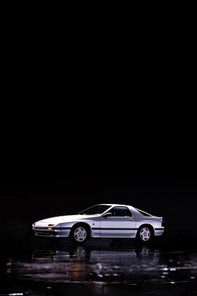 1985 Mazda RX-7 phone wallpaper thumbnail.