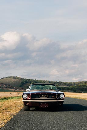 1965 Ringbrothers Ford Mustang Convertible Uncaged phone wallpaper thumbnail.